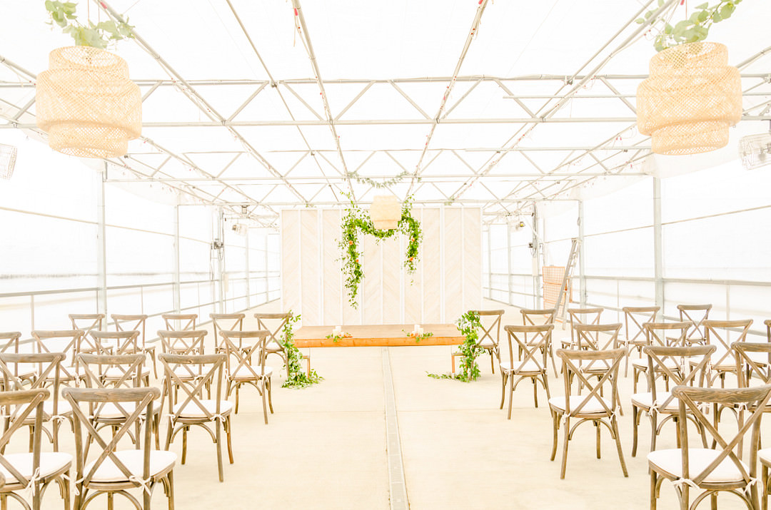 Greenery Foliage Flower Arch Backdrop Greenhouse Ceremony Aisle Citrus Wedding Ideas Pearls & Pines Photography