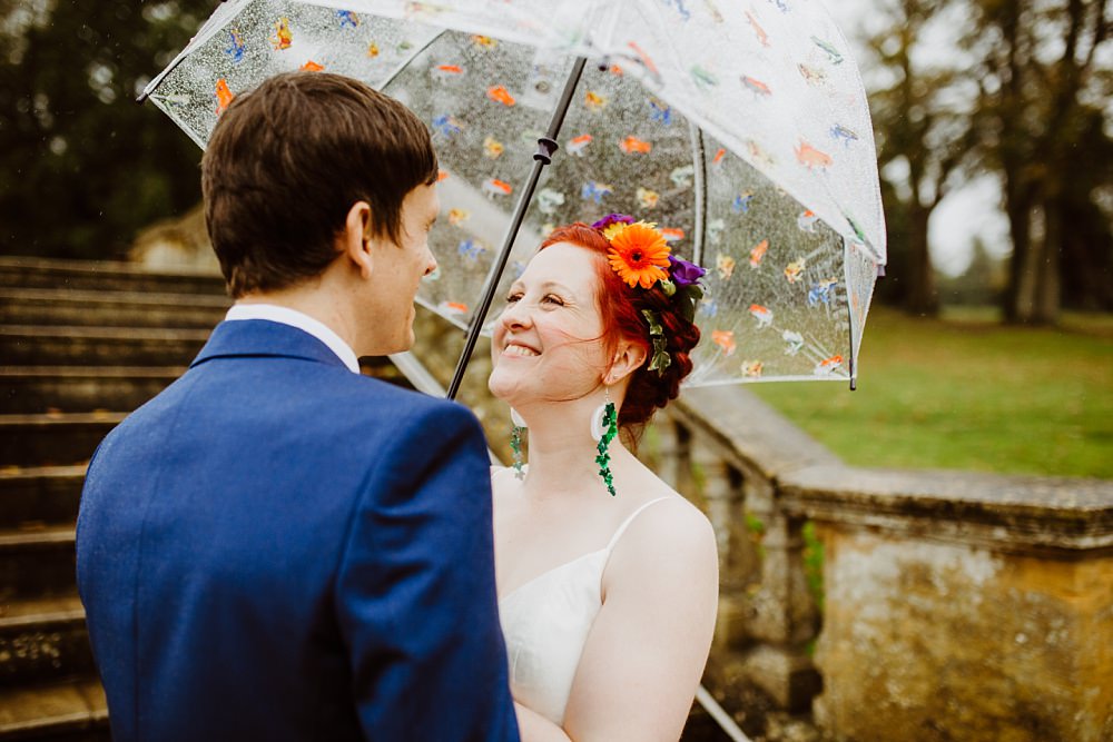 Umbrella Coombe Lodge Wedding Holly Collings Photography