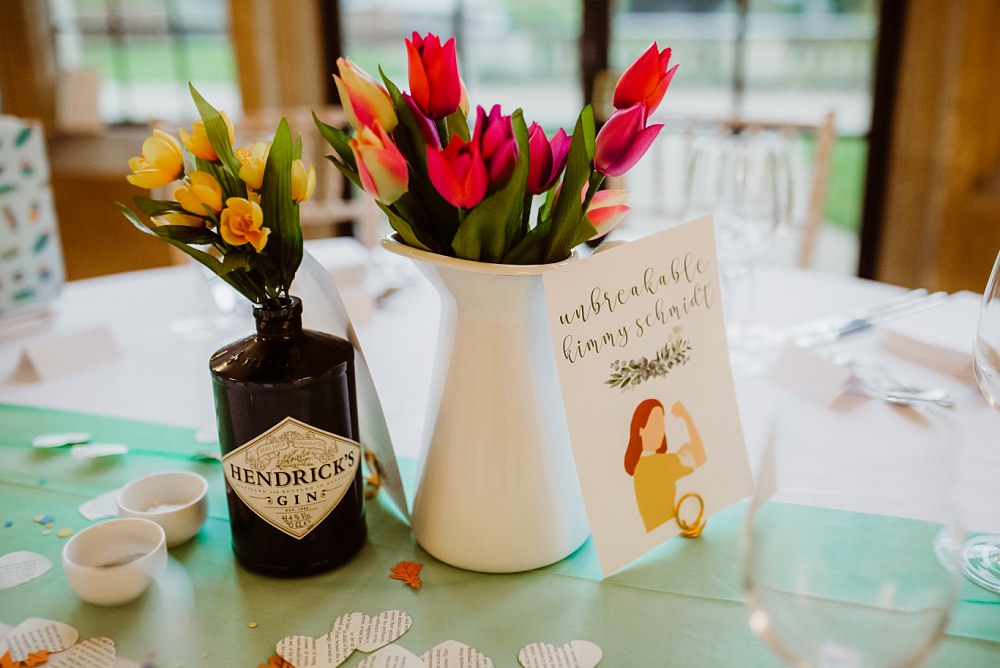 Jug Flowers Tulips Gin Bottle Coombe Lodge Wedding Holly Collings Photography