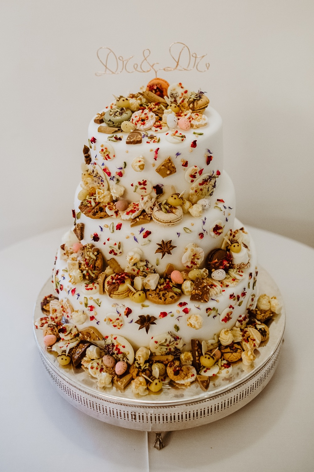 Cake Bees Macaron Biscuit Mini Eggs Petals Coombe Lodge Wedding Holly Collings Photography