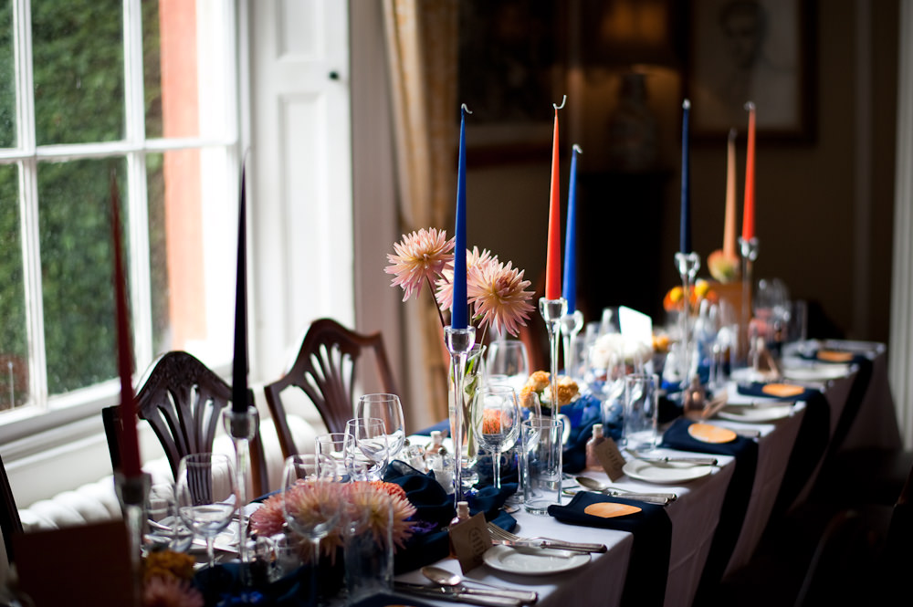 Coral Orange Dahlias Centrepiece Flowers Table Candles Blue Cloth Floral Wedding Rachael Connerton Photography