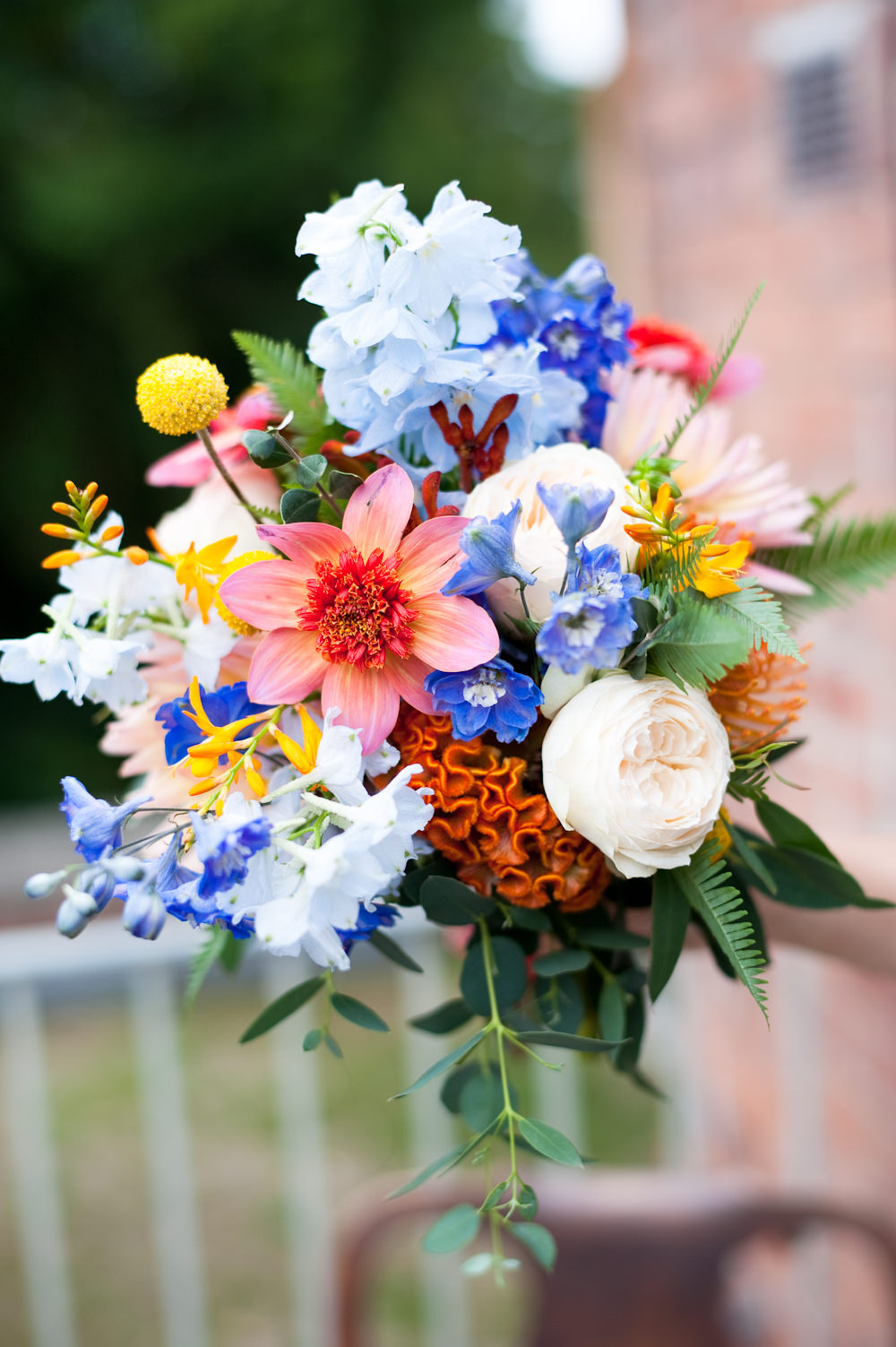 Bouquet Flowers Bride Bridal Colourful Ribbon Orange Blue Delphinium Rose Bridesmaid Floral Wedding Rachael Connerton Photography