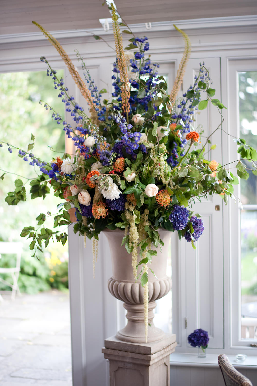Flower Arrangement Orange Blue Floral Wedding Rachael Connerton Photography