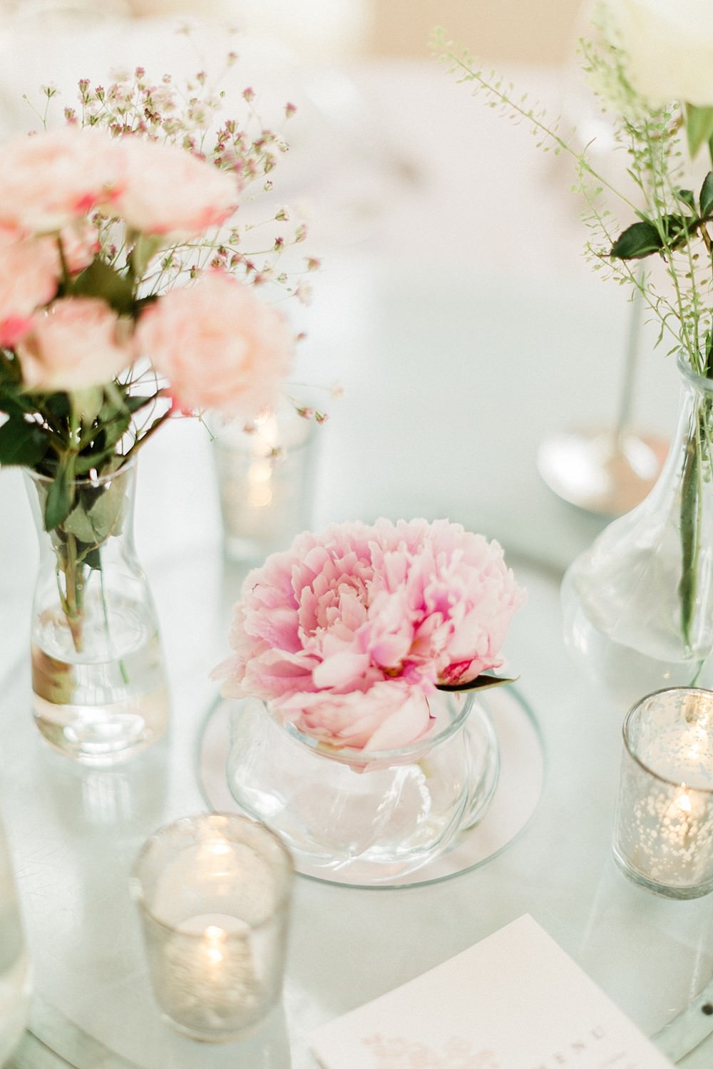 Table Centrepiece Pink Flowesr Bottles Mirror Irish Indian Wedding Jacob & Pauline Photography
