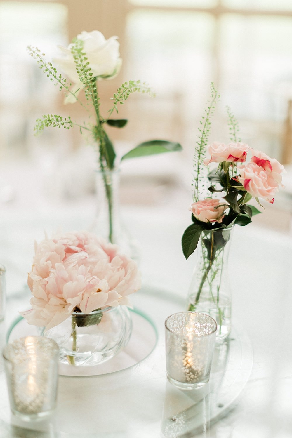 Table Centrepiece Pink Flowesr Bottles Mirror Irish Indian Wedding Jacob & Pauline Photography