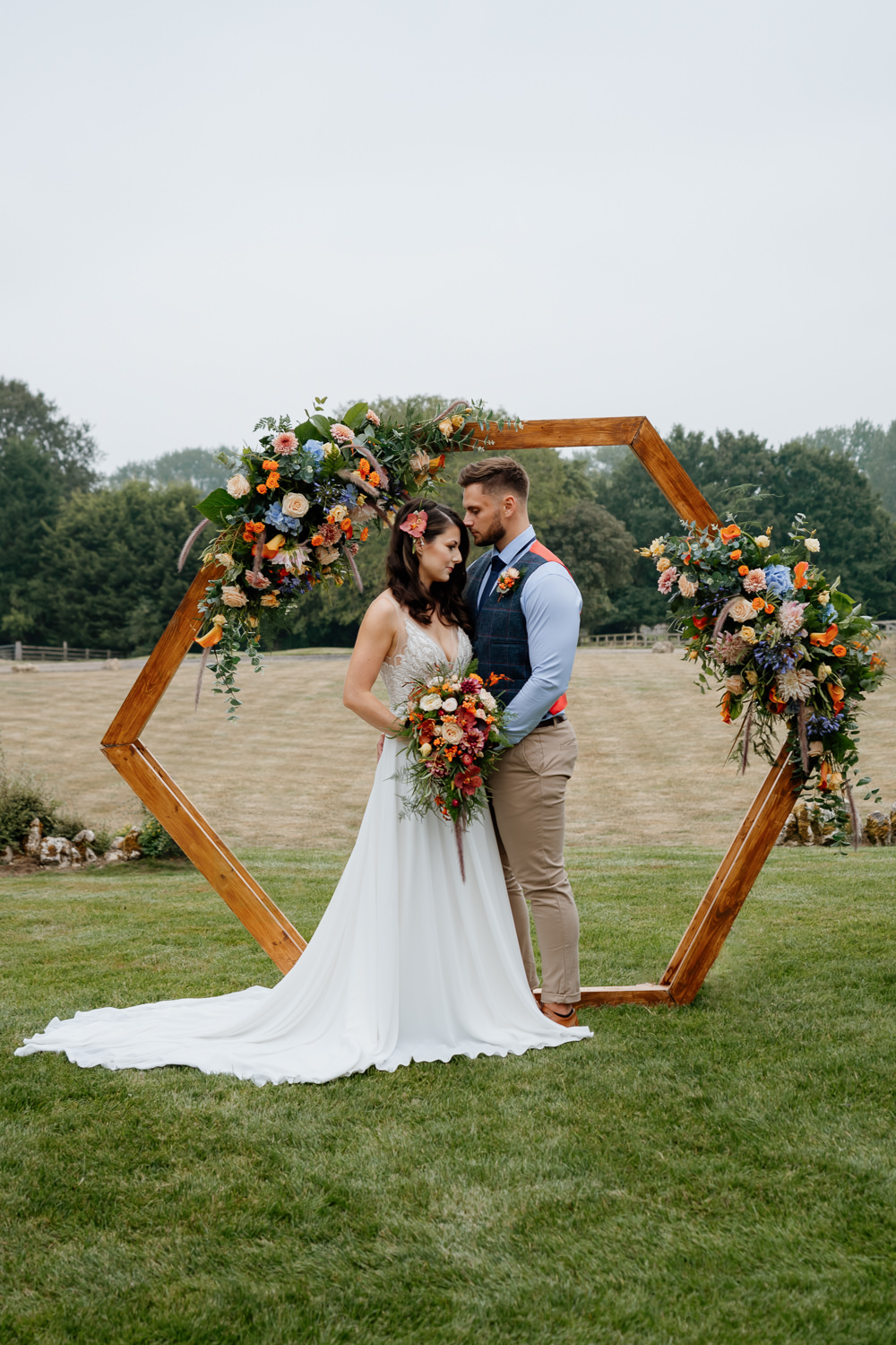 Orange Blue Wedding Steph Kiely Photography Hexagon Flower Arch Backdrop