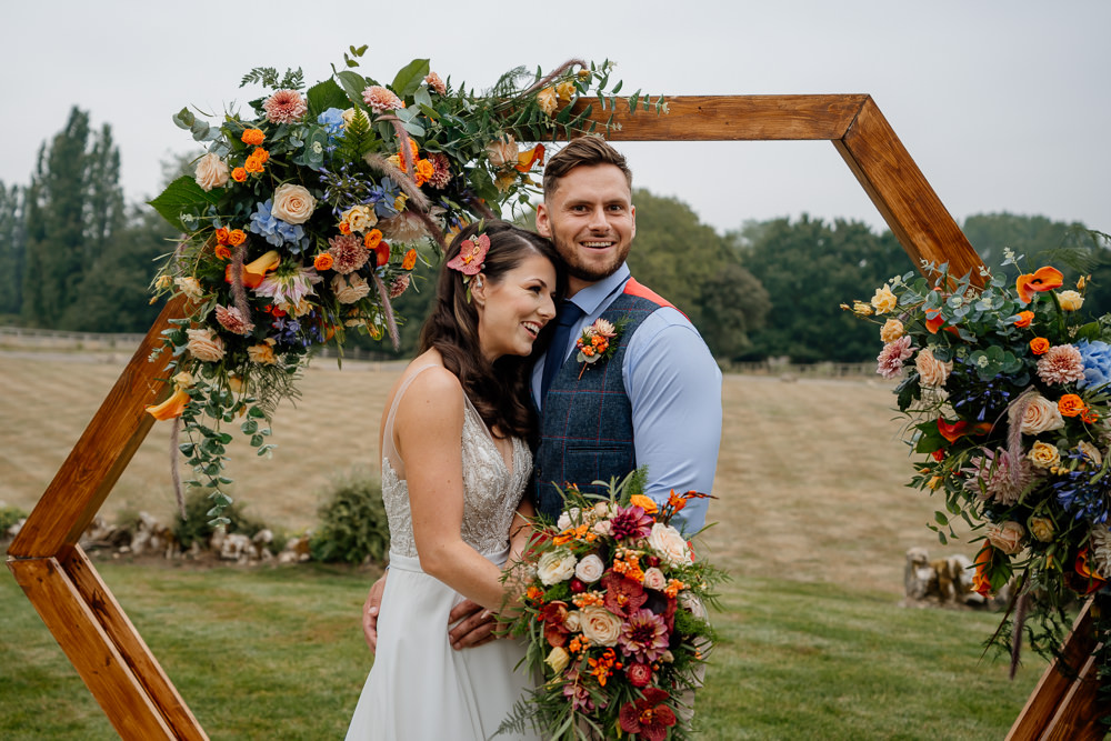 Orange Blue Wedding Steph Kiely Photography Hexagon Flower Arch Backdrop