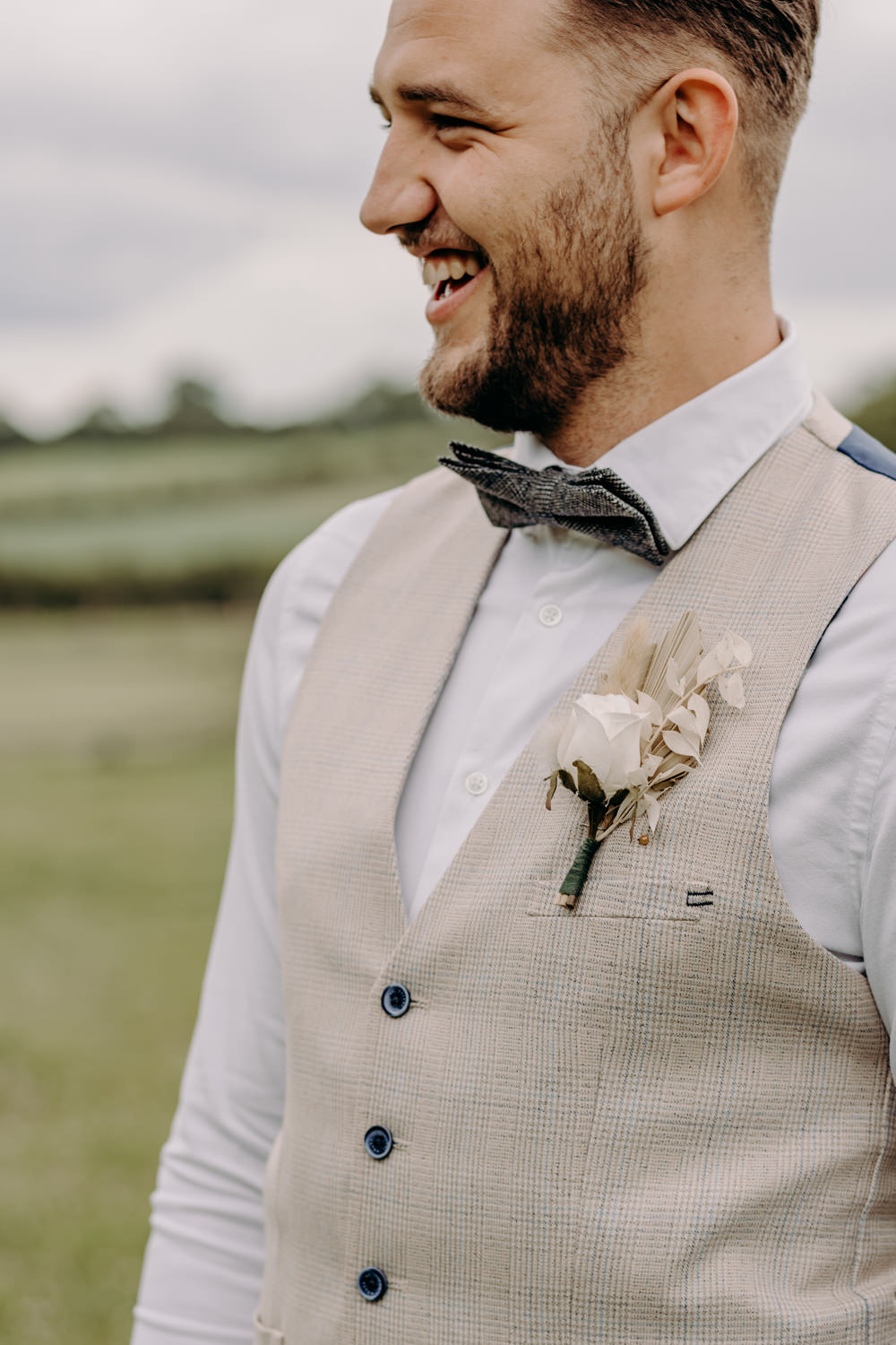 Groom Suit Waistcoat Bow Tie Buttonhole Sustainable Wedding Ideas EKR Pictures