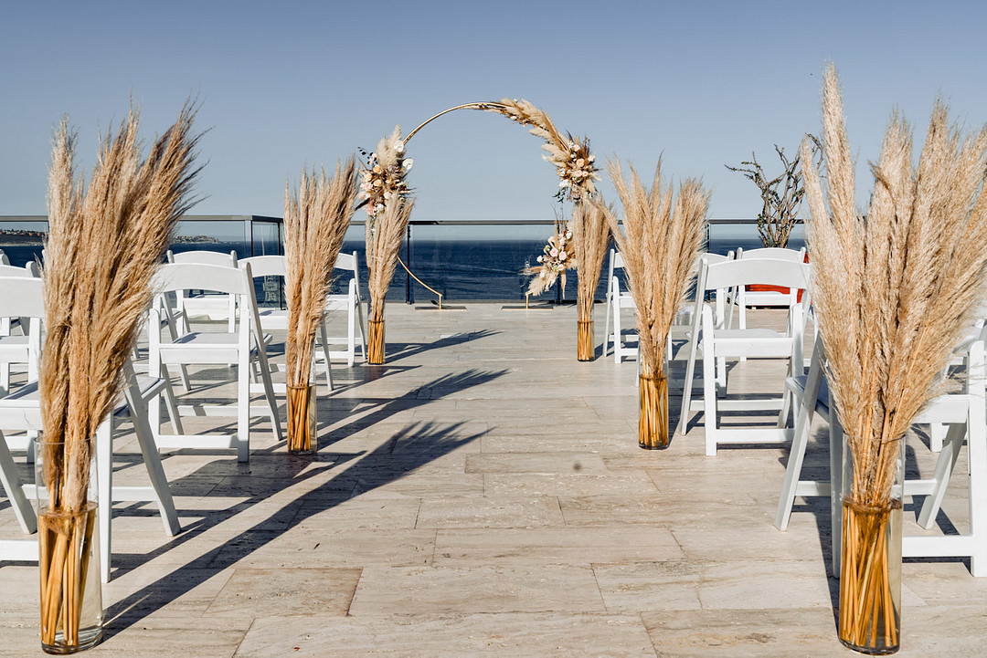 Moongate Flower Arch Pampas Grass Aisle Ceremony Bohemian Mexico Wedding Fabi Rosas Cabo Wedding Photographer
