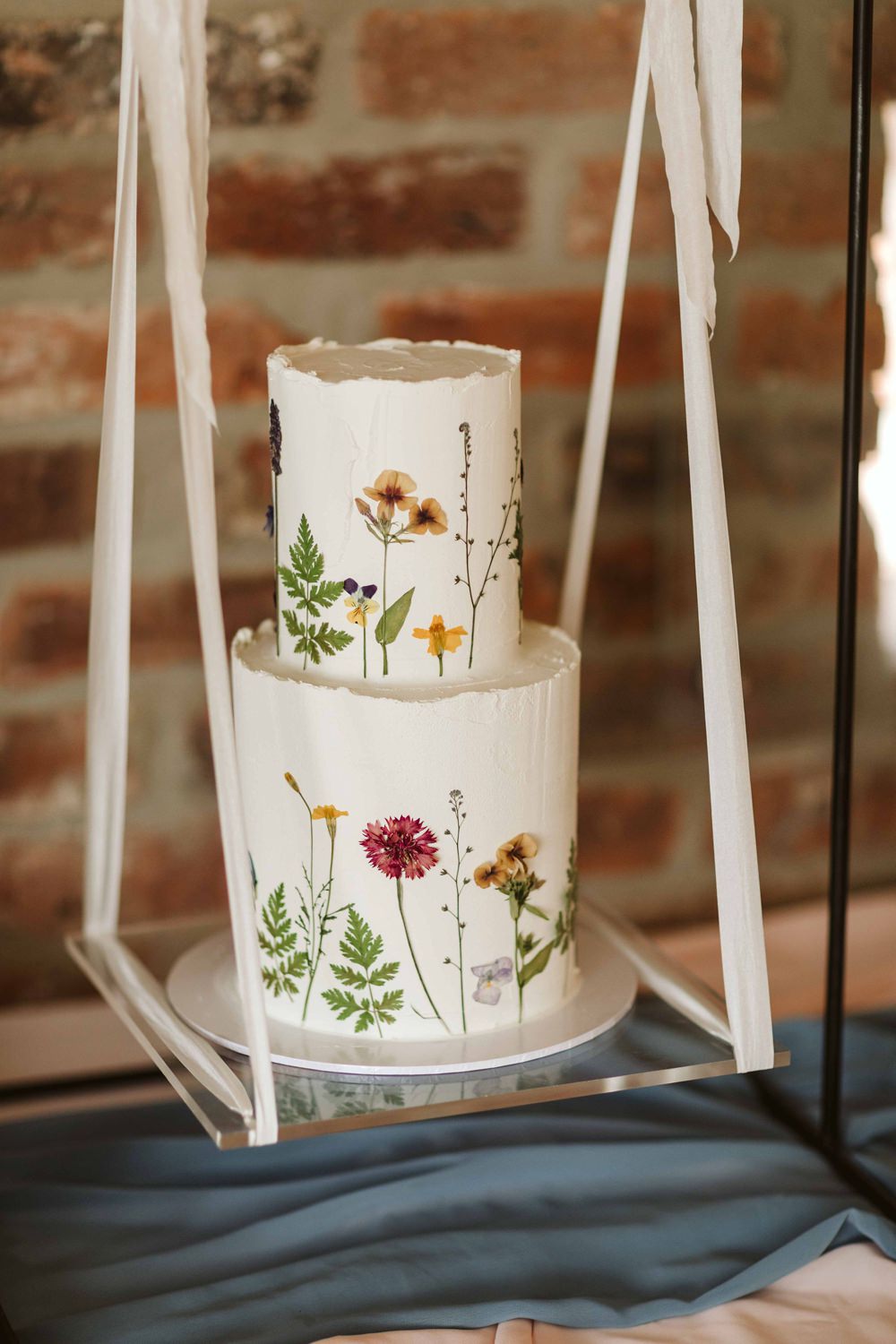 Painted Cake Flowers Floral Swing Table Oakwood at Ryther Wedding Freya Raby