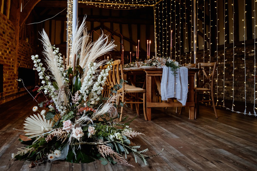 Flower Arrangement Greenery Foliage Pampas Grass Palm Barn Wedding Lights Sharron Gibson