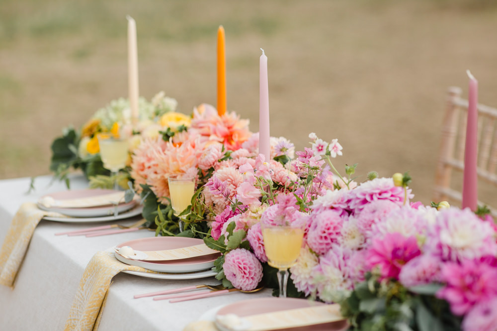 Table Tablescape Decor Flowers Ombre Pink Orange Yellow Candles Rainbow Wedding Ideas Michelle Huggleston Photography