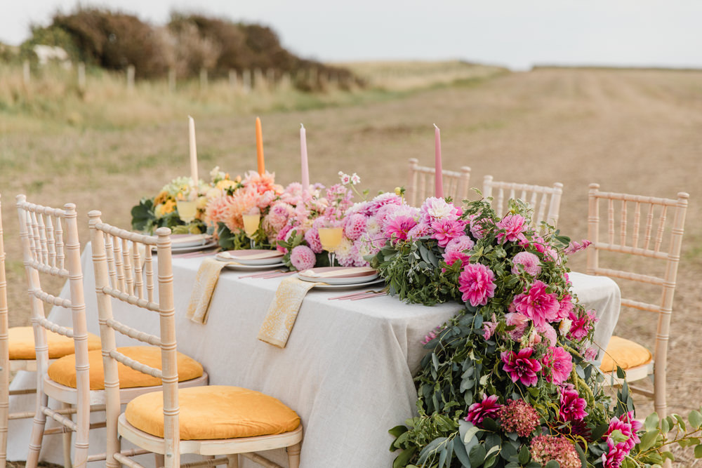 Table Tablescape Decor Flowers Ombre Pink Orange Yellow Candles Rainbow Wedding Ideas Michelle Huggleston Photography