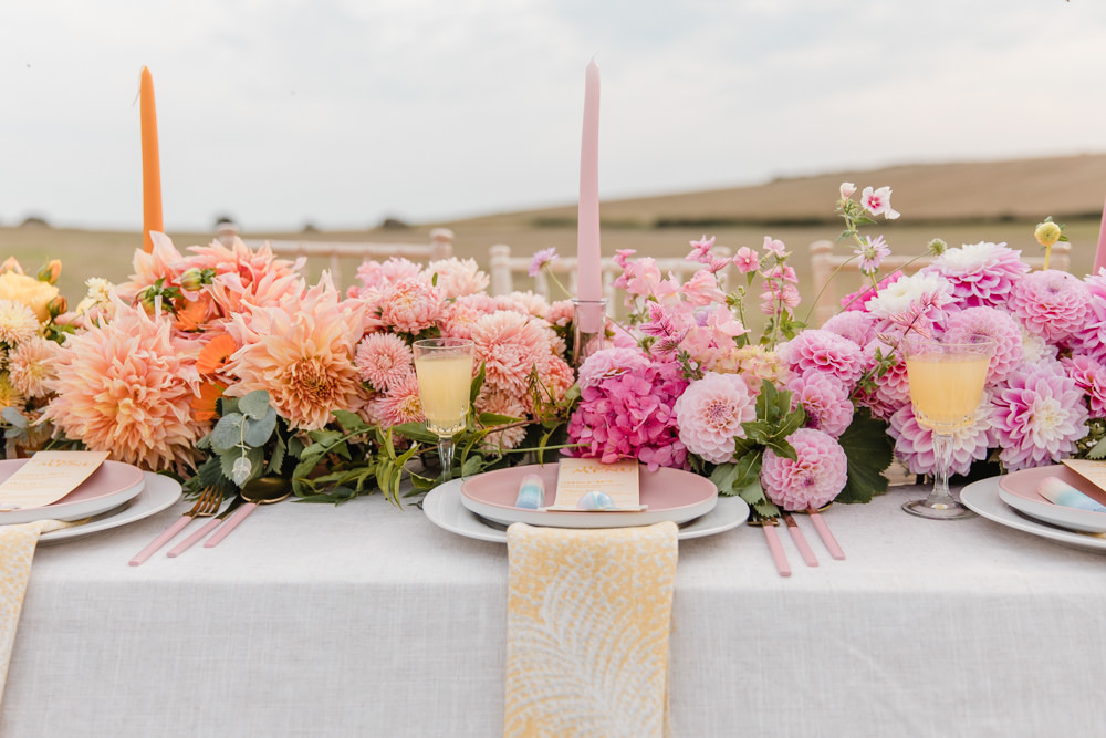 Table Tablescape Decor Flowers Ombre Pink Orange Yellow Candles Rainbow Wedding Ideas Michelle Huggleston Photography