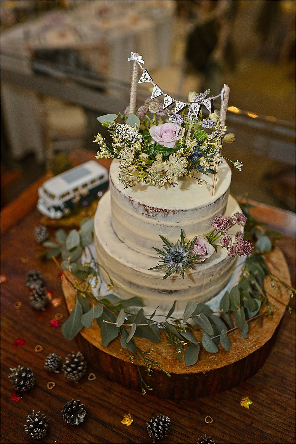 Semi Naked Cake Greenery Foliage Log Slice Stand Browsholme Hall Wedding Jules Fortune Photography