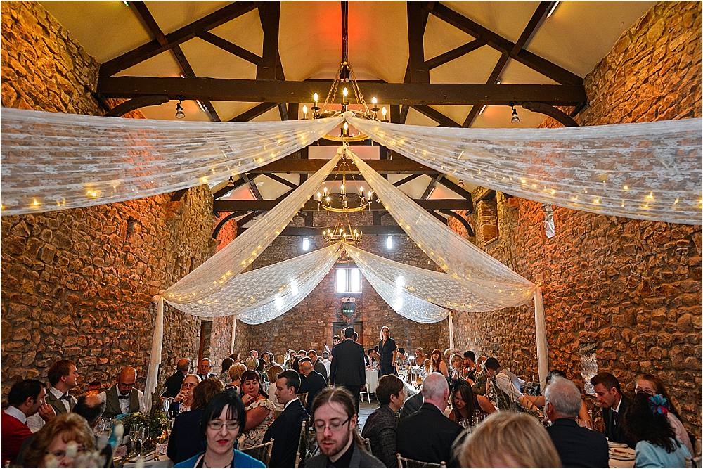 Barn Decor Fariy Lights Drapes Flowers Browsholme Hall Wedding Jules Fortune Photography