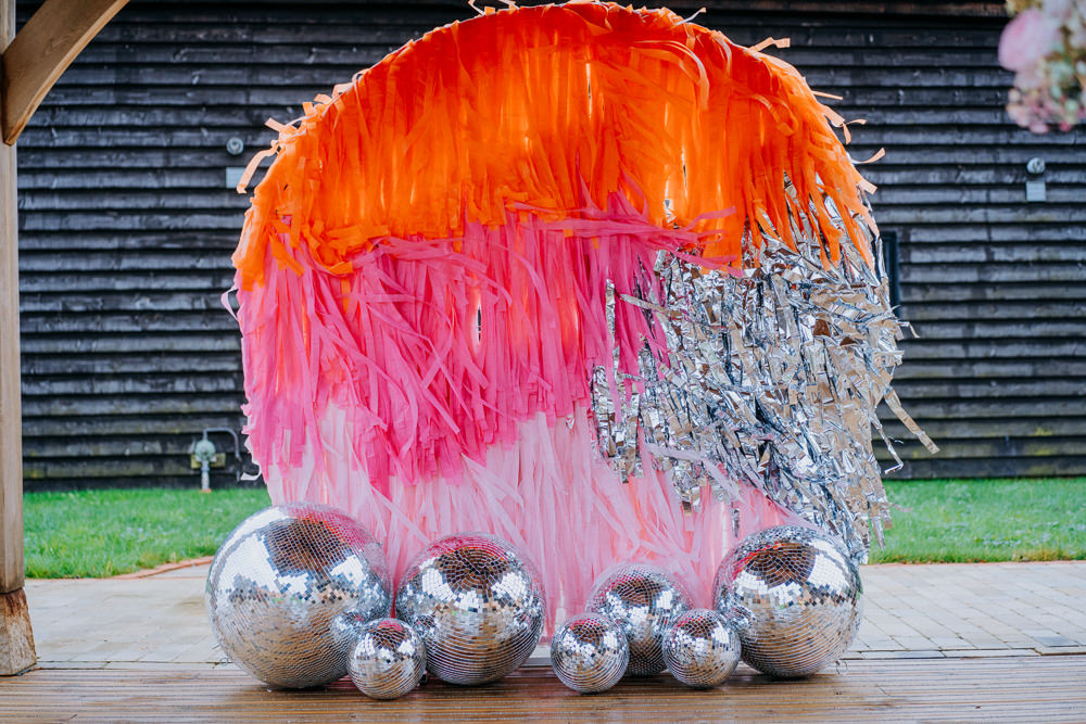 Streamer Backdrop Silver Pink Orange Ceremony Aisle Disco Wedding Ideas Lex Fleming Photo
