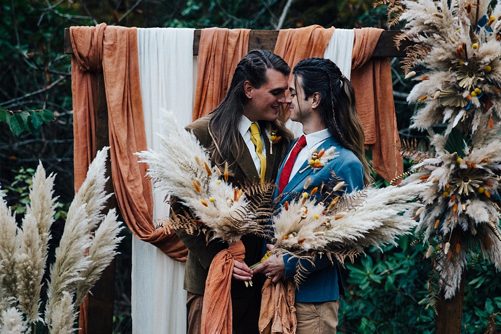 Groom Grooms Fabric Backdrop Orange Pampas Grass Bouquets Mustard Yellow Wedding Ideas Paola de Paola