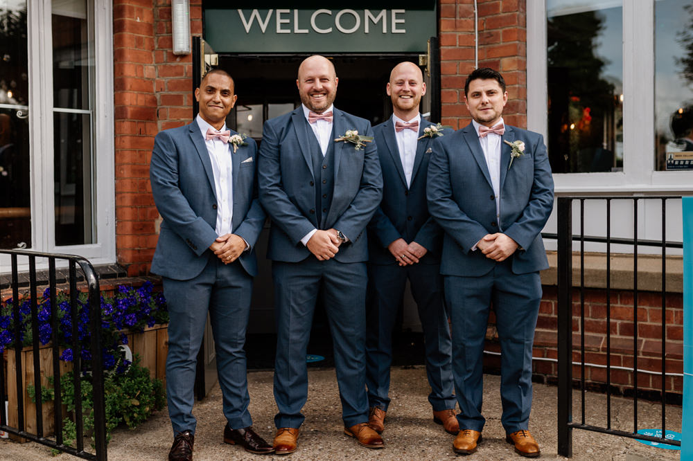 Groom Groomsmen Suit Blue Pink Bow Tie Relaxed Tipi Wedding Twig and Vine Photography