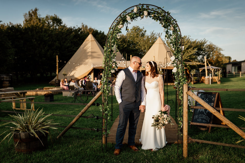 Relaxed Tipi Wedding Twig and Vine Photography Greenery Arch