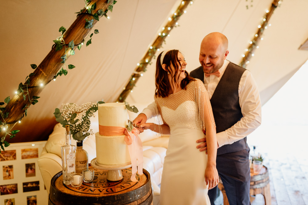 Plain White Cake Pink Ribbon Greenery Relaxed Tipi Wedding Twig and Vine Photography