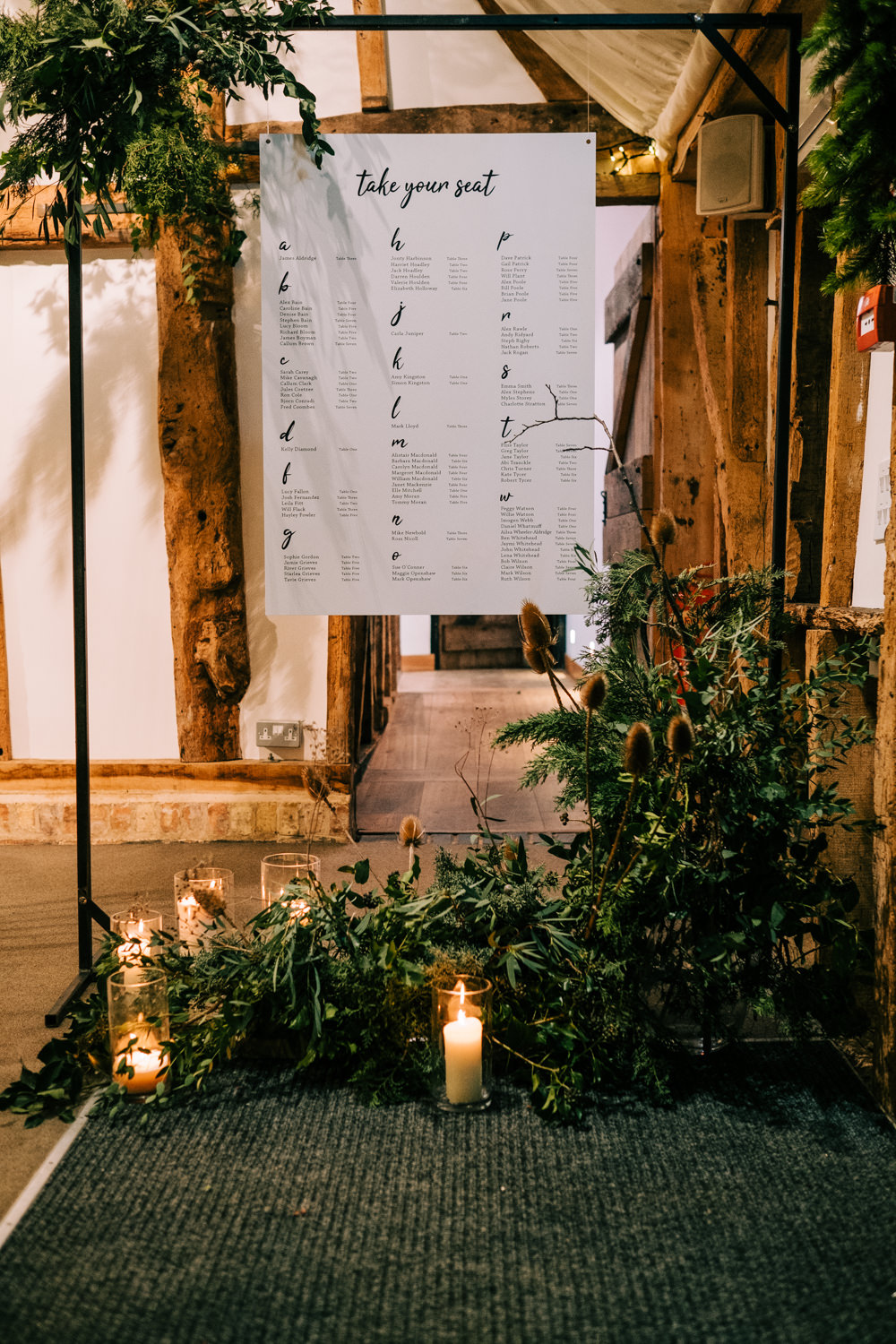 South Farm Christmas Wedding Lee Allison Photography Table Plan Seating Chart Greenery Candles Frame Alphabetical