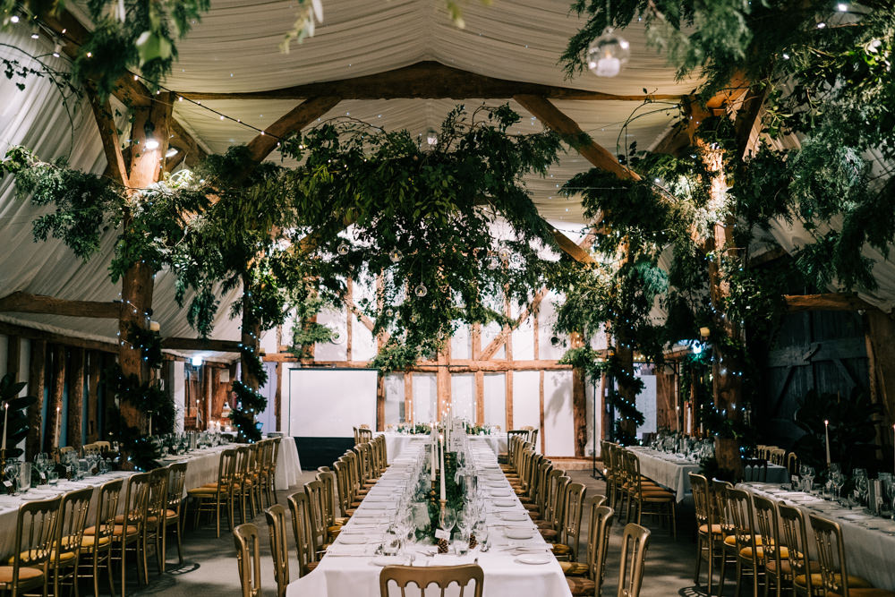Greenery Foliage Barn Decor Festoon Lights Lighting South Farm Christmas Wedding Lee Allison Photography