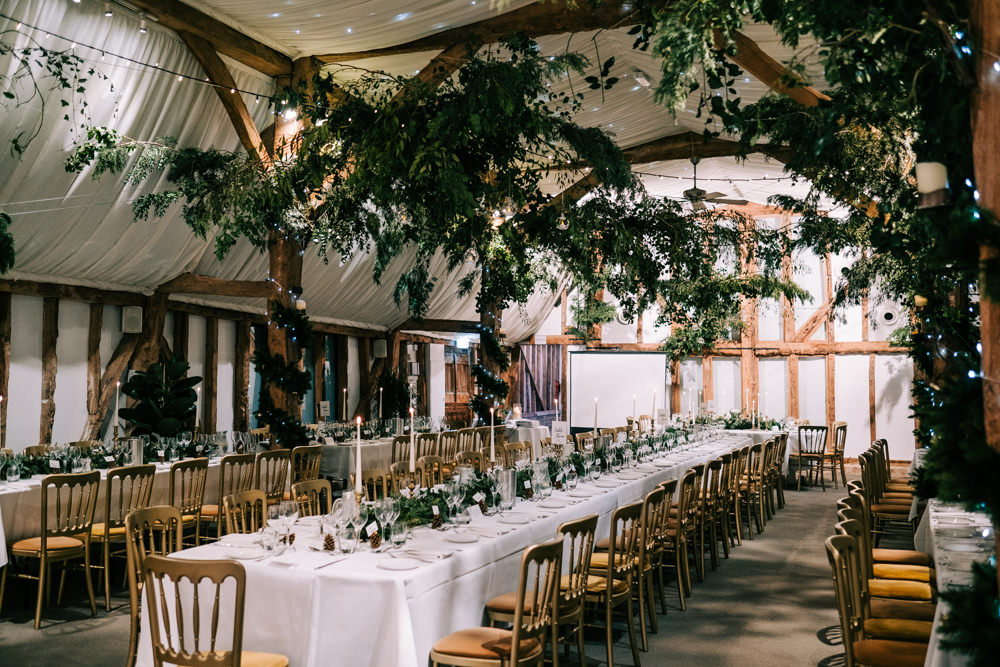 Greenery Foliage Barn Decor Festoon Lights Lighting South Farm Christmas Wedding Lee Allison Photography