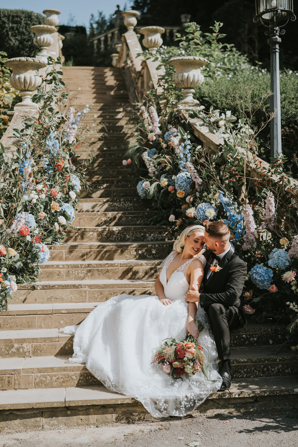Stylish Floral Wedding Poppy Carter Portraits Flower Arrangement Backdrop Stairs Staircase
