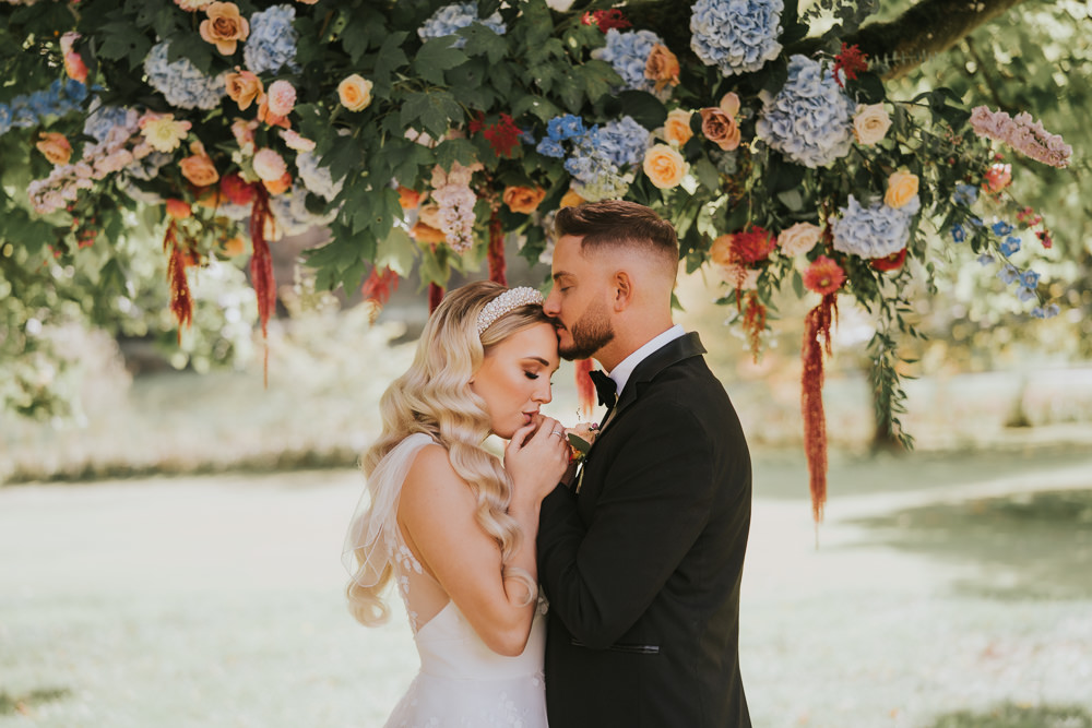 Stylish Floral Wedding Poppy Carter Portraits Flower Installation Hanging Arrangement Backdrop