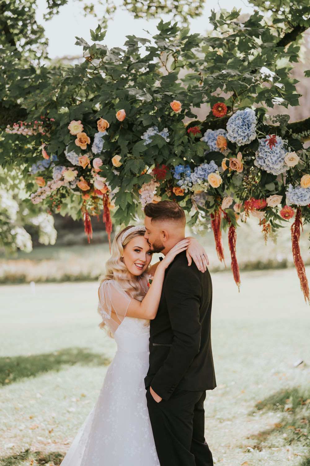 Stylish Floral Wedding Poppy Carter Portraits Flower Installation Hanging Arrangement Backdrop