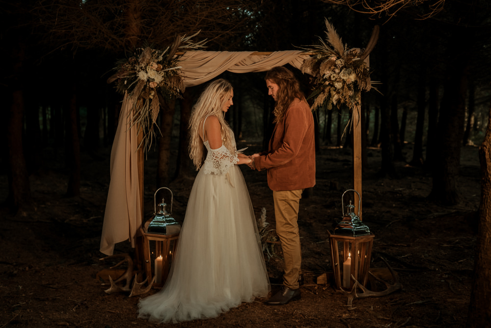 Ceremony Arch Fabric Flowers Candles Wilderness Wedding Ideas Finn and the Fox Photography