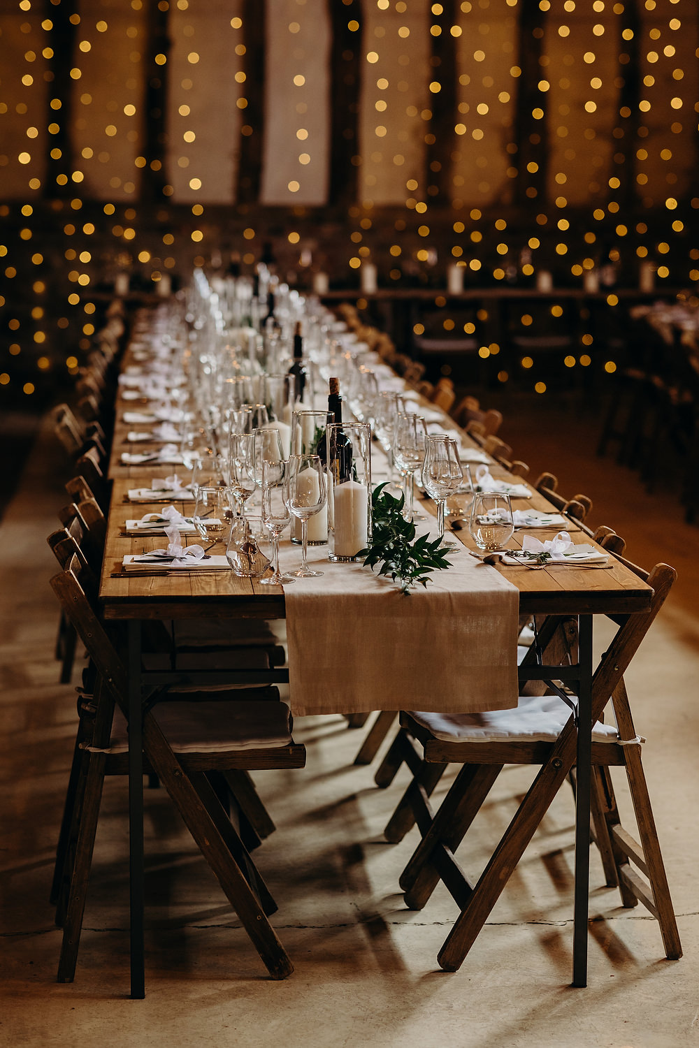 Long Wooden Table Rustic Decor Festoon Lights Greenery Foliage Decor Rustic Berkshire Barn Wedding Richard Skins Photography