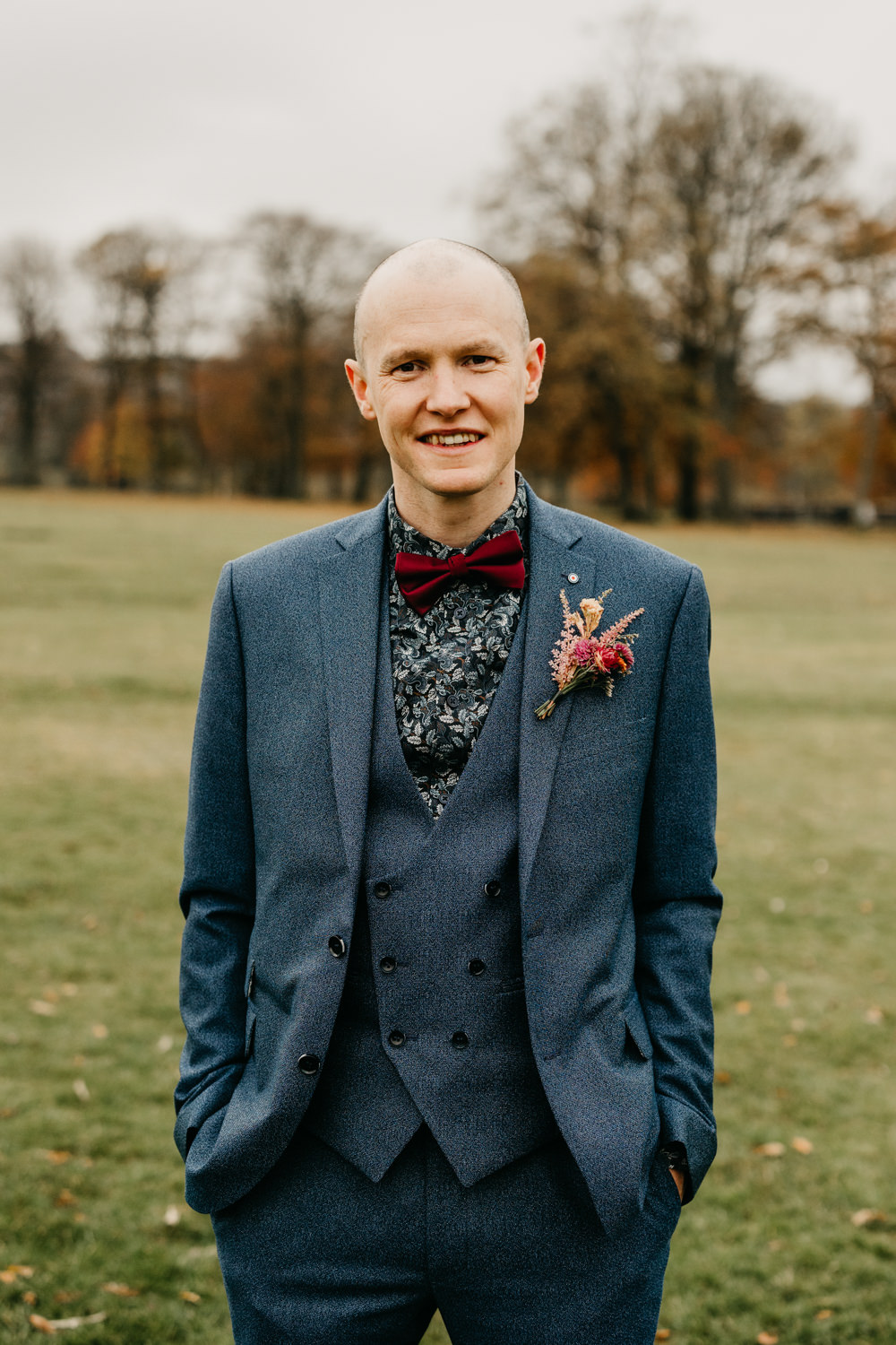 Groom Suit Blue Floral Shirt Bow Tie Buttonhole Flowers Bandstand Wedding Emma Lawson Photography