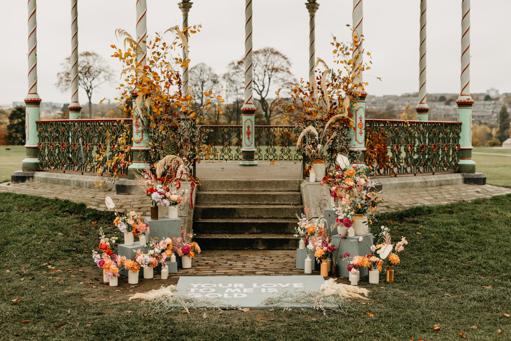 Outdoor Ceremony Autumn Flowers Bandstand Wedding Emma Lawson Photography
