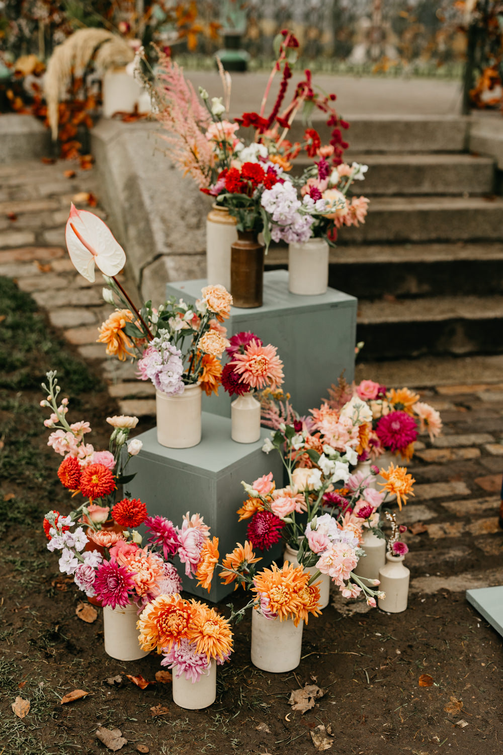 Orange Red Dahlia Outdoor Ceremony Autumn Flowers Bandstand Wedding Emma Lawson Photography