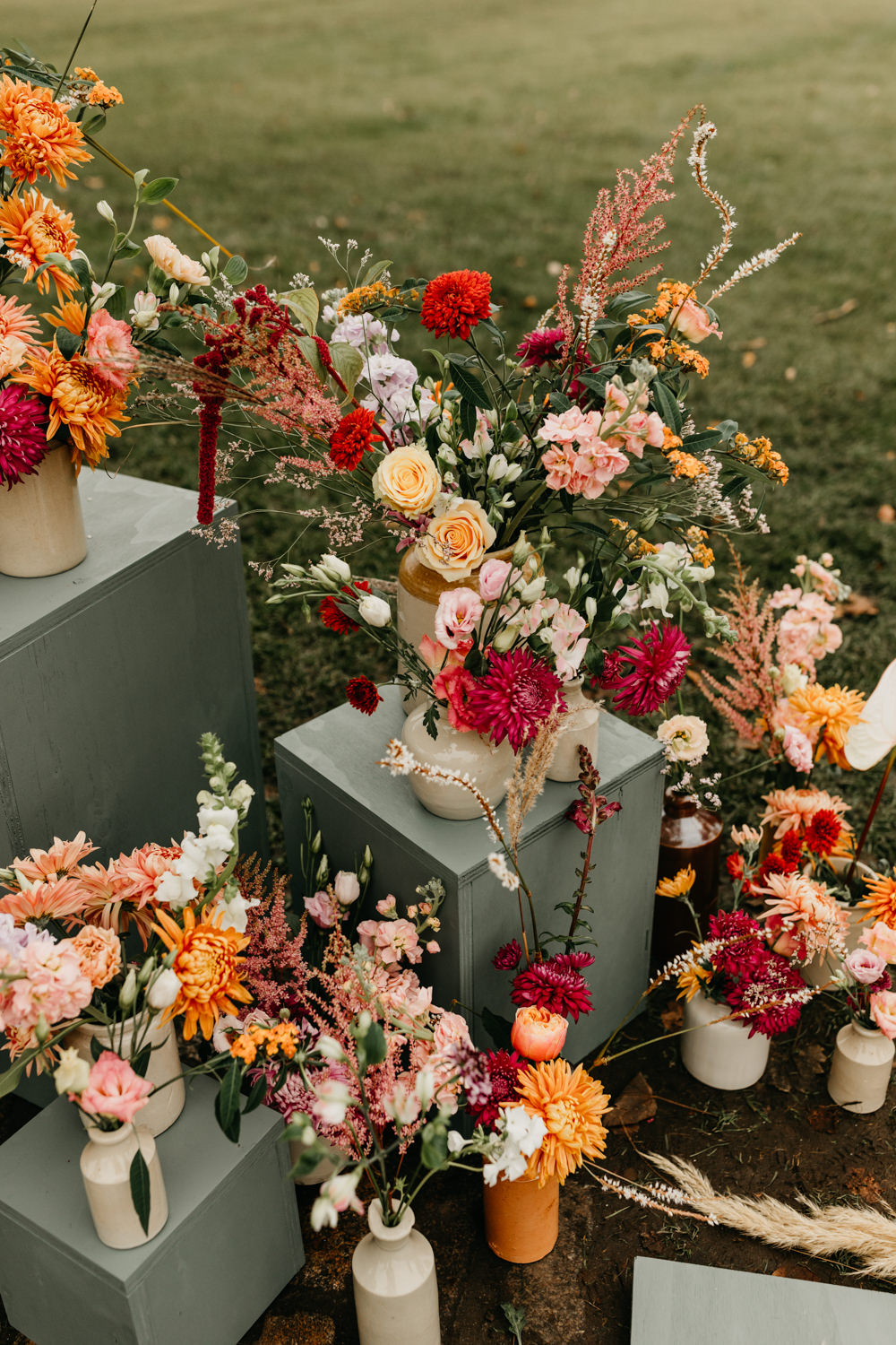 Orange Red Dahlia Outdoor Ceremony Autumn Flowers Bandstand Wedding Emma Lawson Photography