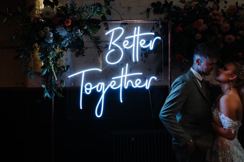 Neon Sign Backdrop Flowers Dark Wedding Ideas Esther Louise Triffitt Photography