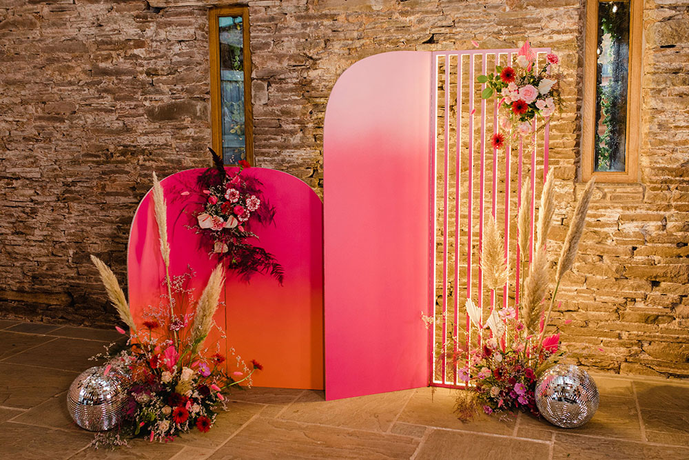 Curved Backdrop Pink Orange Flowers Pampas Grass Disco Ball Wedding Michelle Huggleston