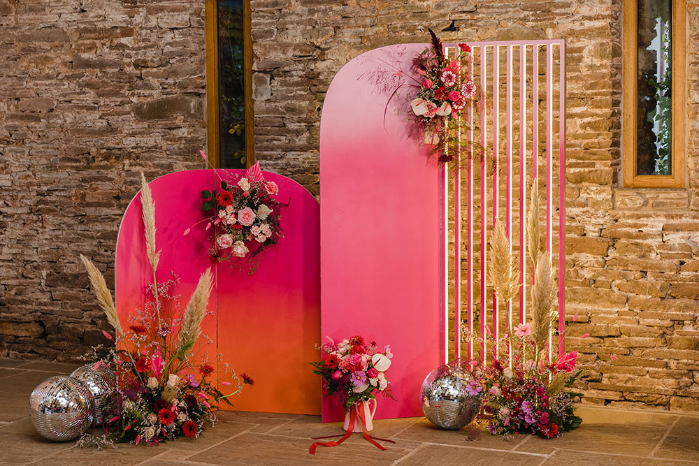 Curved Backdrop Pink Orange Flowers Pampas Grass Disco Ball Wedding Michelle Huggleston