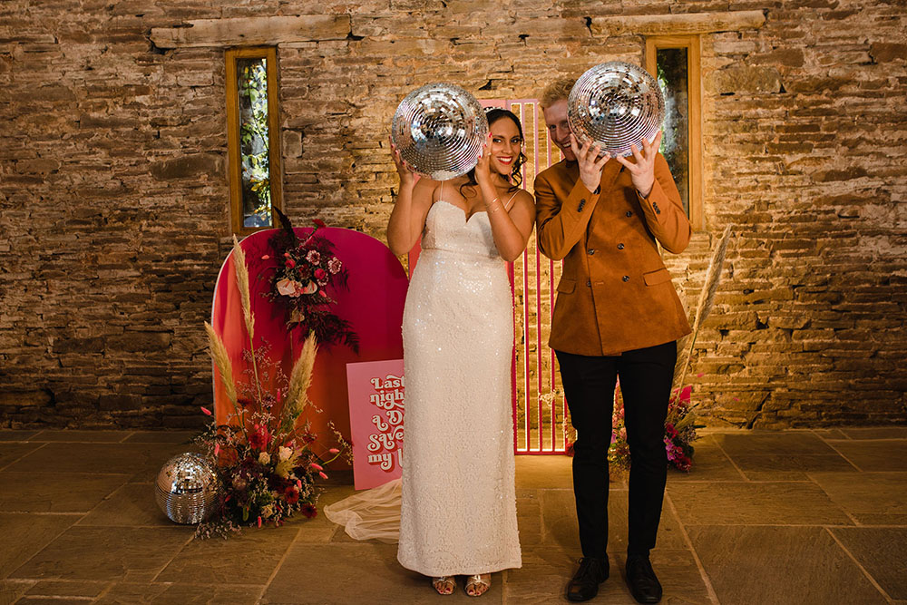 Curved Backdrop Pink Orange Flowers Pampas Grass Disco Ball Wedding Michelle Huggleston