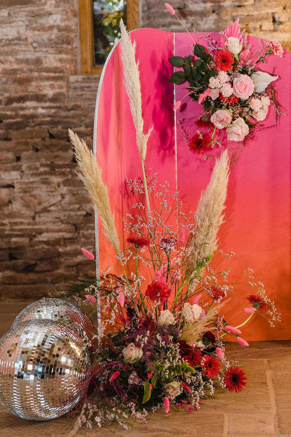 Curved Backdrop Pink Orange Flowers Pampas Grass Disco Ball Wedding Michelle Huggleston