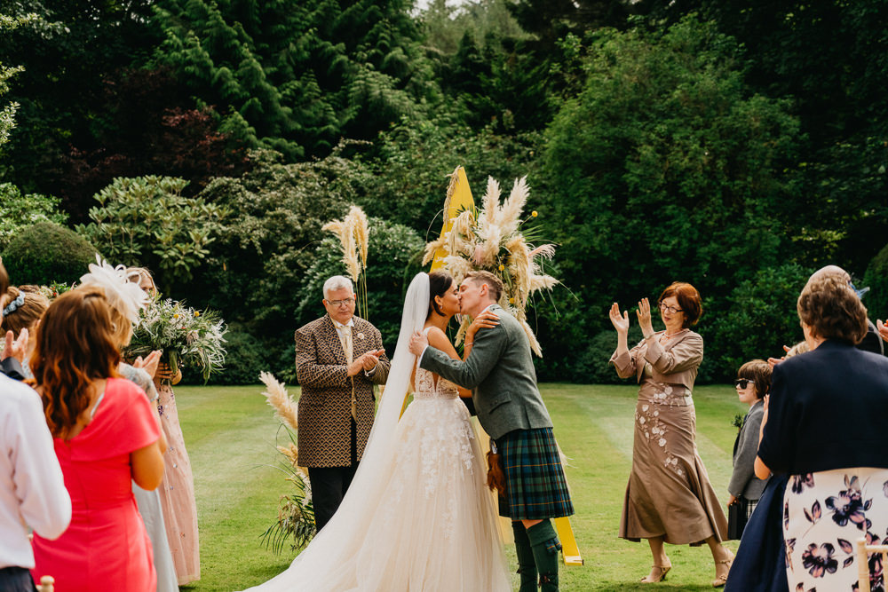 Outdoor Ceremony Triangle A Frame Pampas Grass Elsick House Wedding Firefly and Embers Photography