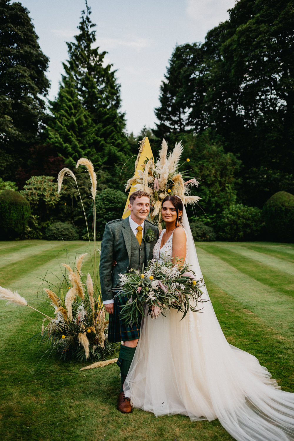 Elsick House Wedding Firefly and Embers Photography Outdoor Ceremony Triangle A Frame Pampas Grass