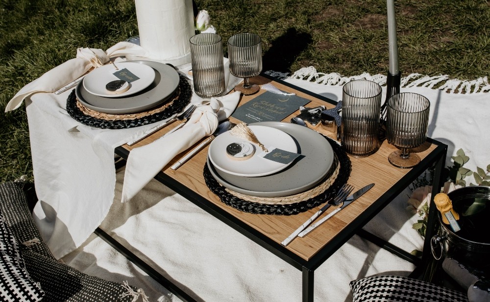Picnic Table Tablescape Blankets Flowers Candles Interstellar Wedding Ideas Doriane Descamps Photography