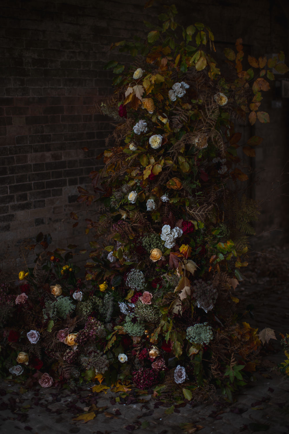 Somerley House Wedding Andrea Verenini Flower Installation Arrangement Yellow Red
