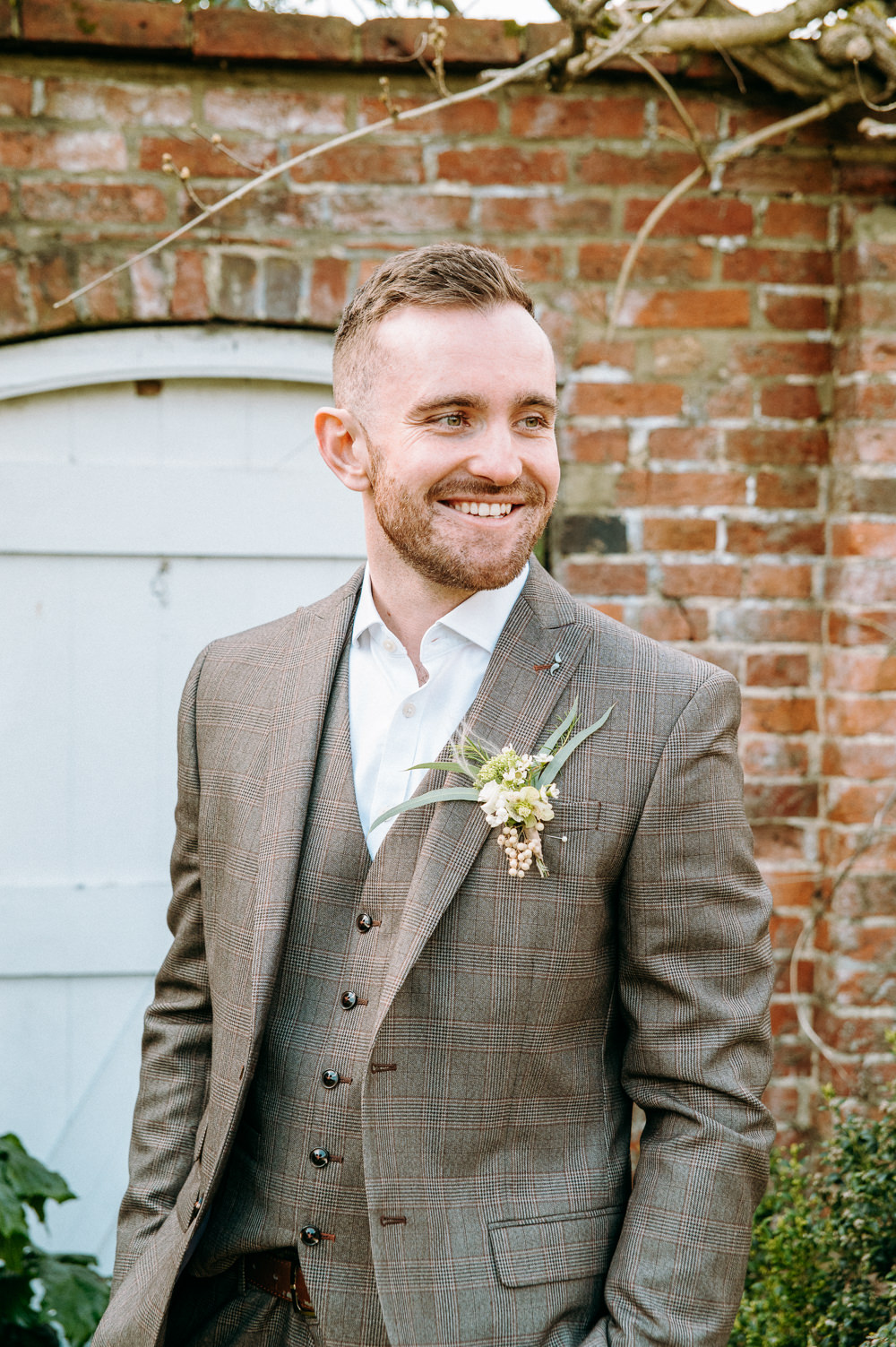Groom Check Suit Buttonhole Flowers Countryside Elopement Chloe Martin Photo