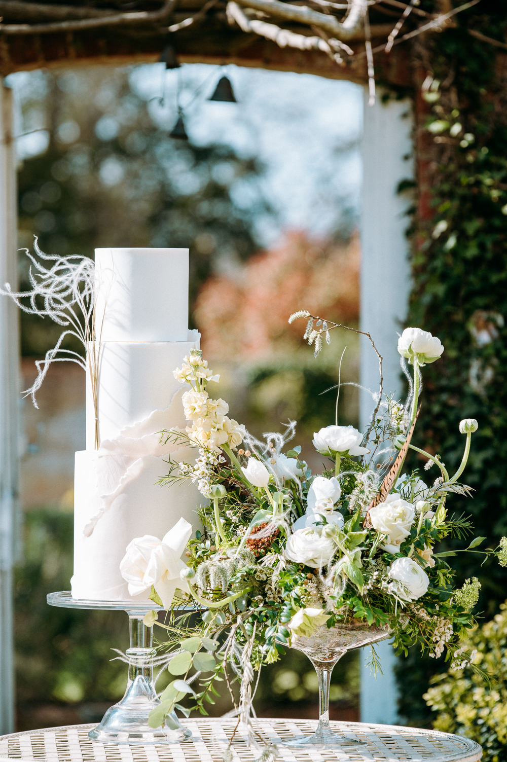 Iced White Cake Feather Flowers Countryside Elopement Chloe Martin Photo