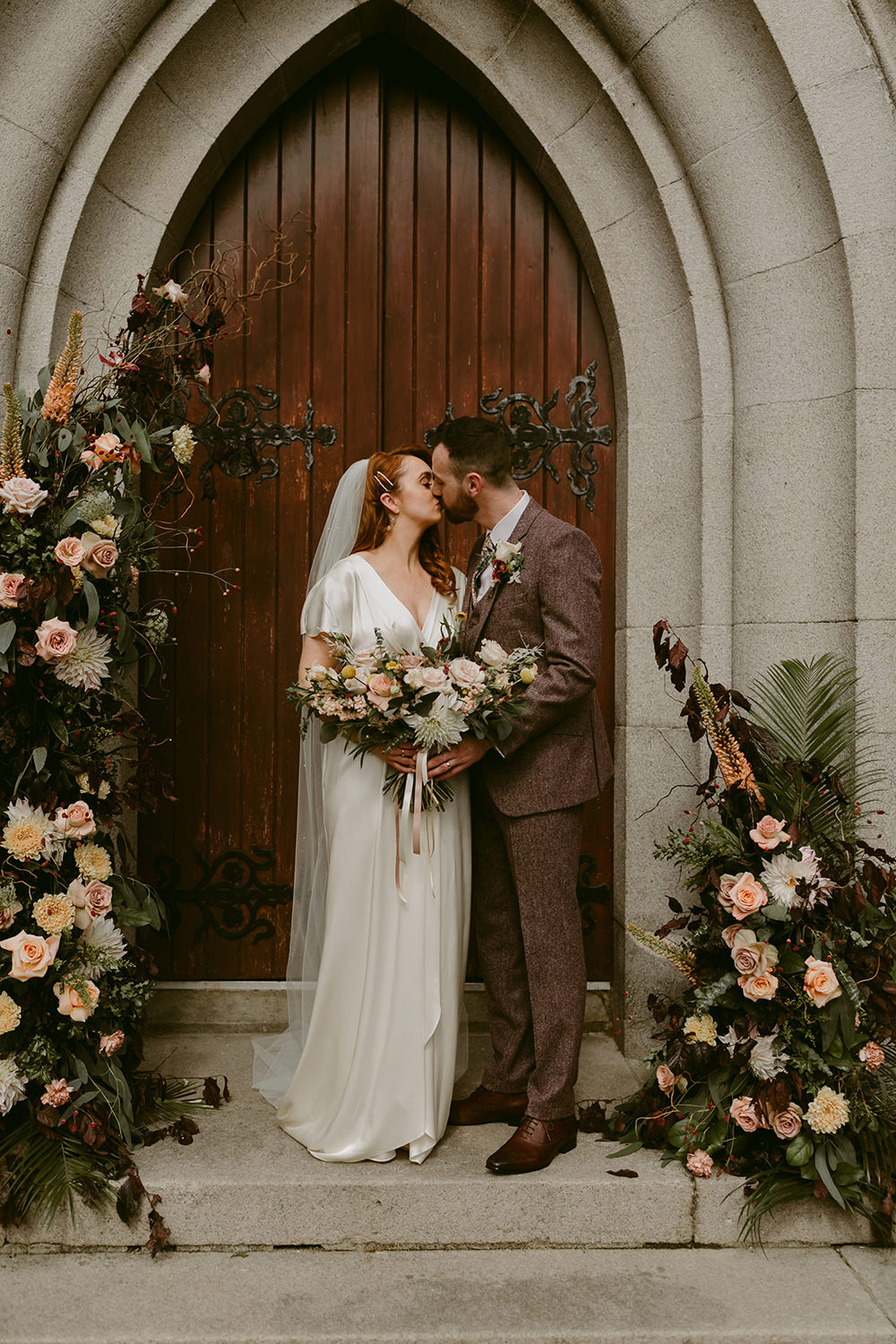 Darver Castle Wedding Adam and Grace Flower Arch Installation Church Door Entrance Pink Rose Greenery