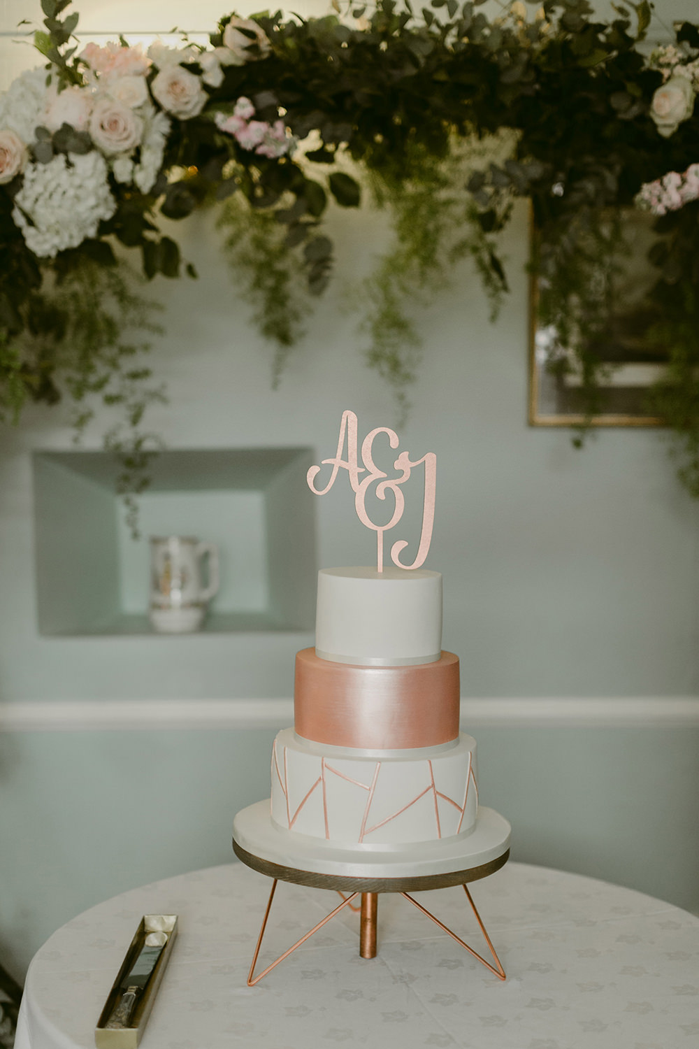 Rose Gold Cake Initial Topper Greemery Foliage Arch Lissanoure Castle Wedding Adam and Grace